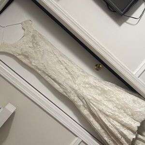Elegant Cream Lace Dress fits like size 2